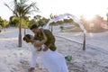 Caucasian newlywed couple dancing and enjoying at beach at wedding ceremony, copy space Royalty Free Stock Photo