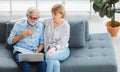 Caucasian old senior elderly lovely lover grandparents romantic couple gray hair and bearded husband and wife sitting smiling