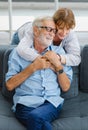 Caucasian old senior elderly lovely lover grandparents romantic couple gray hair and bearded husband and wife smiling sitting