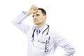 Caucasian physician with glasses in chest pocket medical gown fatigue concept. Royalty Free Stock Photo