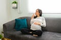 Caucasian pregnant woman with a nicotine addiction Royalty Free Stock Photo