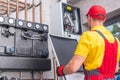 HVAC Technician Performing Gas Heater Check Royalty Free Stock Photo