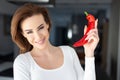 Caucasian 30s woman holding red chilli pepper Royalty Free Stock Photo