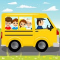 Caucasian school kids riding a schoolbus