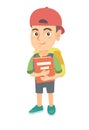 Caucasian schoolboy with backpack and textbook.