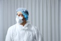 Caucasian Scientific experimenter man Wearing blue protective rubber gloves and standing in Laboratory. Science and covid19 visus Royalty Free Stock Photo