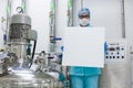 Plant picture, scientist standing on steel stairs, hold empty pa