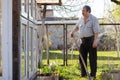 Caucasian Senior man with shovel digging garden bed or farm Royalty Free Stock Photo