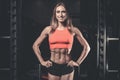 Caucasian fitness female model in gym close up abs Royalty Free Stock Photo