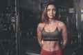 Caucasian fitness female model in gym close up abs Royalty Free Stock Photo