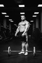 Caucasian fitness male model execute exercise with barbell Royalty Free Stock Photo