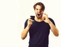 Caucasian young macho holding coffee cup Royalty Free Stock Photo