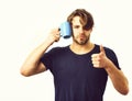 Caucasian young macho holding coffee cup or mug Royalty Free Stock Photo