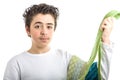 Caucasian smooth-skinned boy holding extravagant green ties