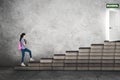 Caucasian student walking toward a school door Royalty Free Stock Photo