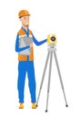 Caucasian surveyor builder working with theodolite