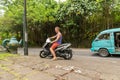 Caucasian tourist on motorbike