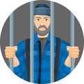 Caucasian unshaven man behind bars in round button isolated on white Royalty Free Stock Photo