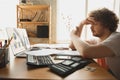 Caucasian upset and despair man watching financial and economical graphs going down during coronavirus quarantine Royalty Free Stock Photo