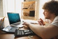 Caucasian upset and despair man watching financial and economical graphs going down during coronavirus quarantine Royalty Free Stock Photo