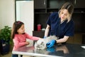 Caucasian veterinarian doing a medical check-up on a cat