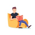 Caucasian white man relaxing with a book on the armchair. Young clever student reading