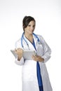 Caucasian woman doctor or nurse holding a laptop computer Royalty Free Stock Photo