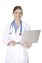 Caucasian woman doctor or nurse holding a laptop computer Royalty Free Stock Photo