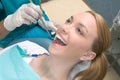 Caucasian woman and African-American dentist Royalty Free Stock Photo