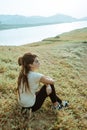 Caucasian woman alone sitting