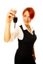 Caucasian woman as hotel worker offering key