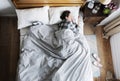 Caucasian woman on bed sleeping comfortable