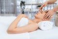 Caucasian woman enjoying relaxing anti-stress head massage. Quiescent