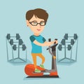 Caucasian woman exercising on elliptical trainer. Royalty Free Stock Photo