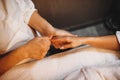 Caucasian woman having a spa session for her hand fingers at a young therapist Royalty Free Stock Photo