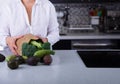 Caucasian Woman Holding Brownpaper Bag Full of Green Vegetables Royalty Free Stock Photo