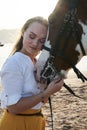 Caucasian woman hugging horse slow motion. Love and friendship concept. Royalty Free Stock Photo