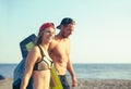 Caucasian woman kitesurfer enjoying summertime on her boyfriend Royalty Free Stock Photo