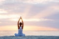 Caucasian woman practicing yoga at seashore Royalty Free Stock Photo