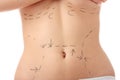 Caucasian woman's abdomen marked with lines Royalty Free Stock Photo