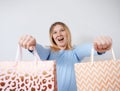 Caucasian woman with shopping bags isolated on white background Royalty Free Stock Photo