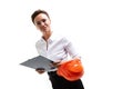 Cheerful lady with short dark hair, in beautiful office suit, orange comstruction helmet plans something with tablet Royalty Free Stock Photo