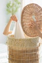 caucasian woman sorting dirty laundry basket, laundry at home Royalty Free Stock Photo