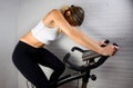 Caucasian Woman on Stationary Bike