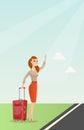 Young caucasian woman with suitcase hitchhiking.