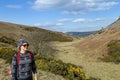 Caucasian woman trekking around Lauder