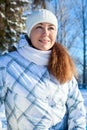 Caucasian woman in winter clothes at sunny day, portrait Royalty Free Stock Photo