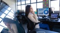 Caucasian woman working on computer and thoughtful