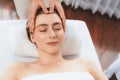 Caucasian woman enjoying relaxing anti-stress head massage. Quiescent