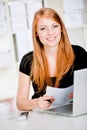 Caucasian Women with Pen and Laptop Royalty Free Stock Photo